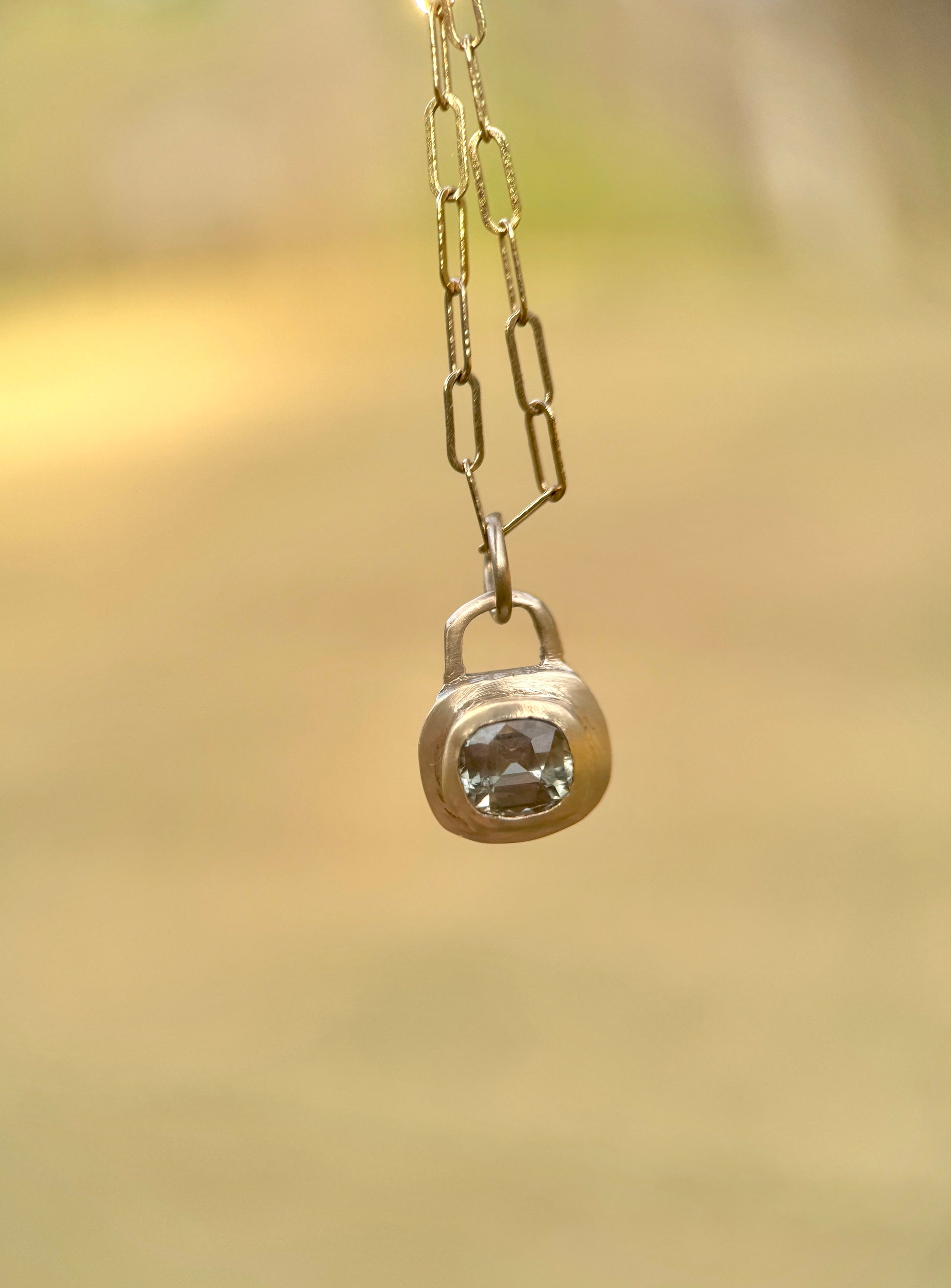 Mint sapphire lock pendant