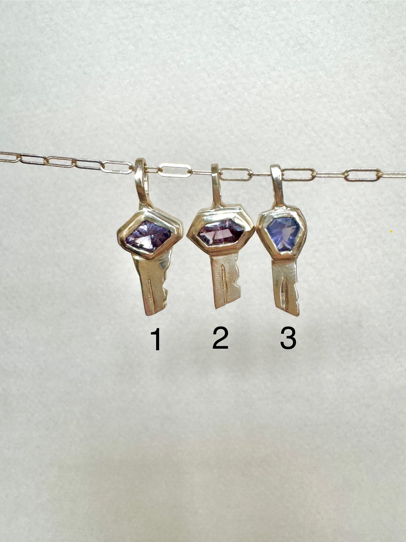 Petite keys: pink and purple spinels - Mellis Fine