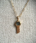 Montana sapphire key pendant