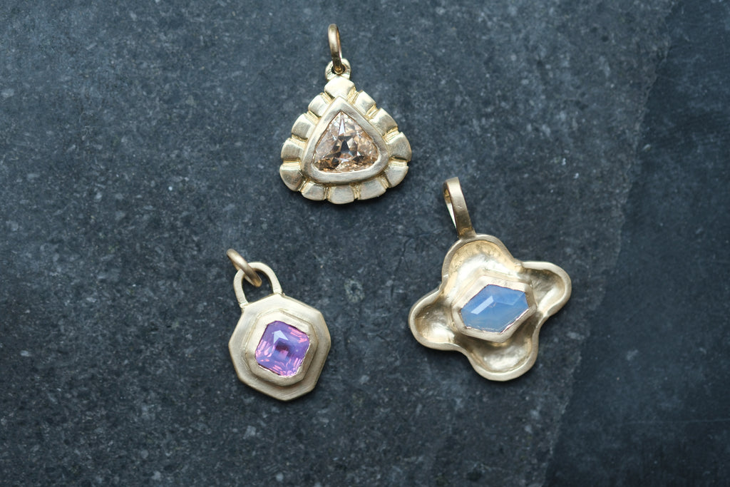 Pinky purple sapphire lock pendant