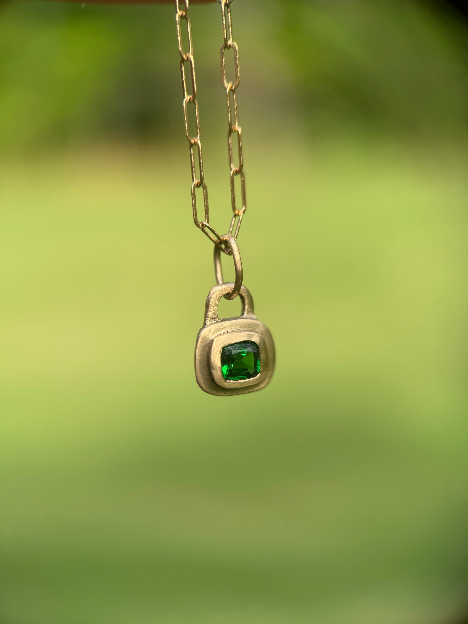 Tsavorite garnet lock pendant