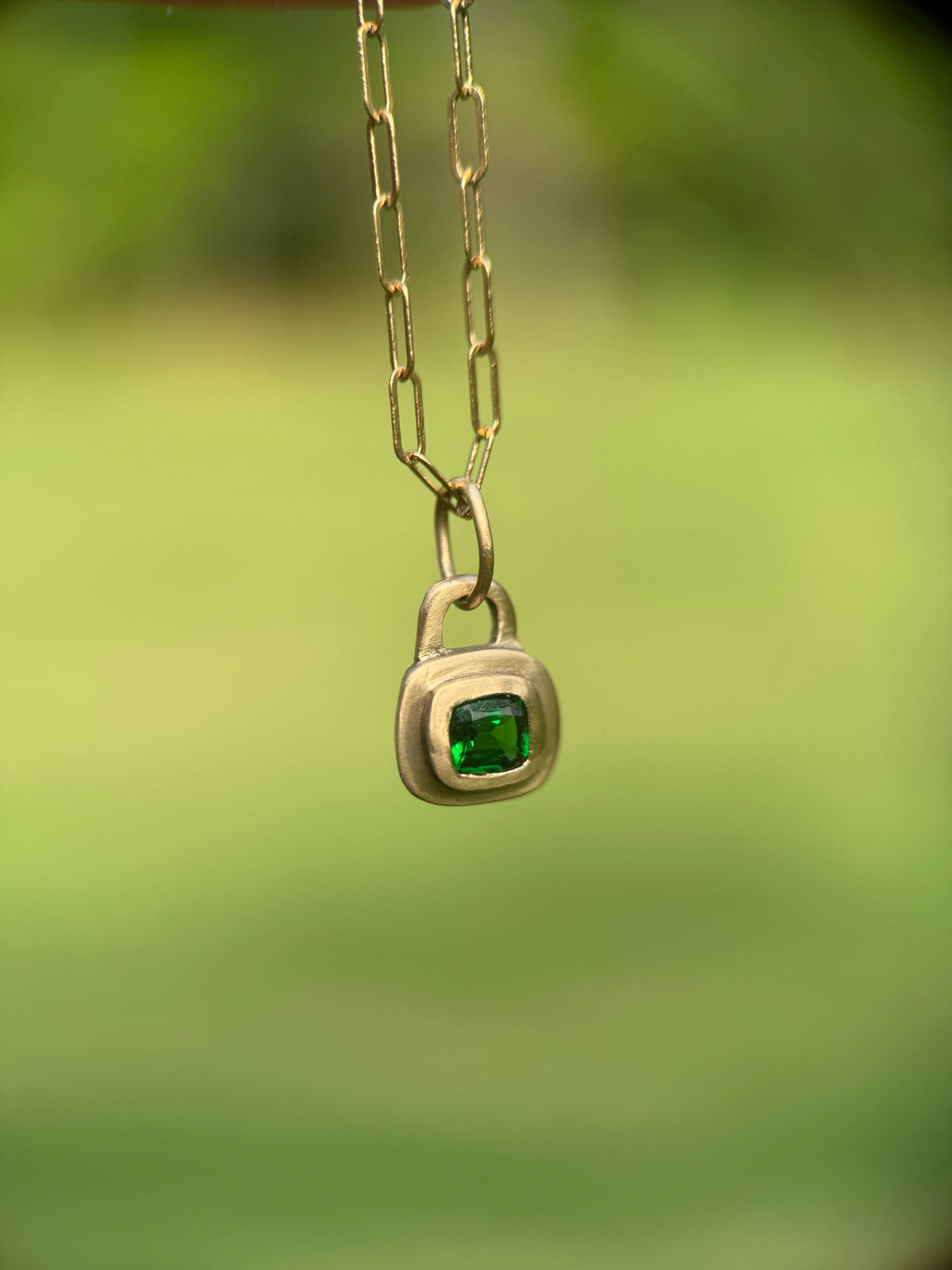 Tsavorite garnet lock pendant