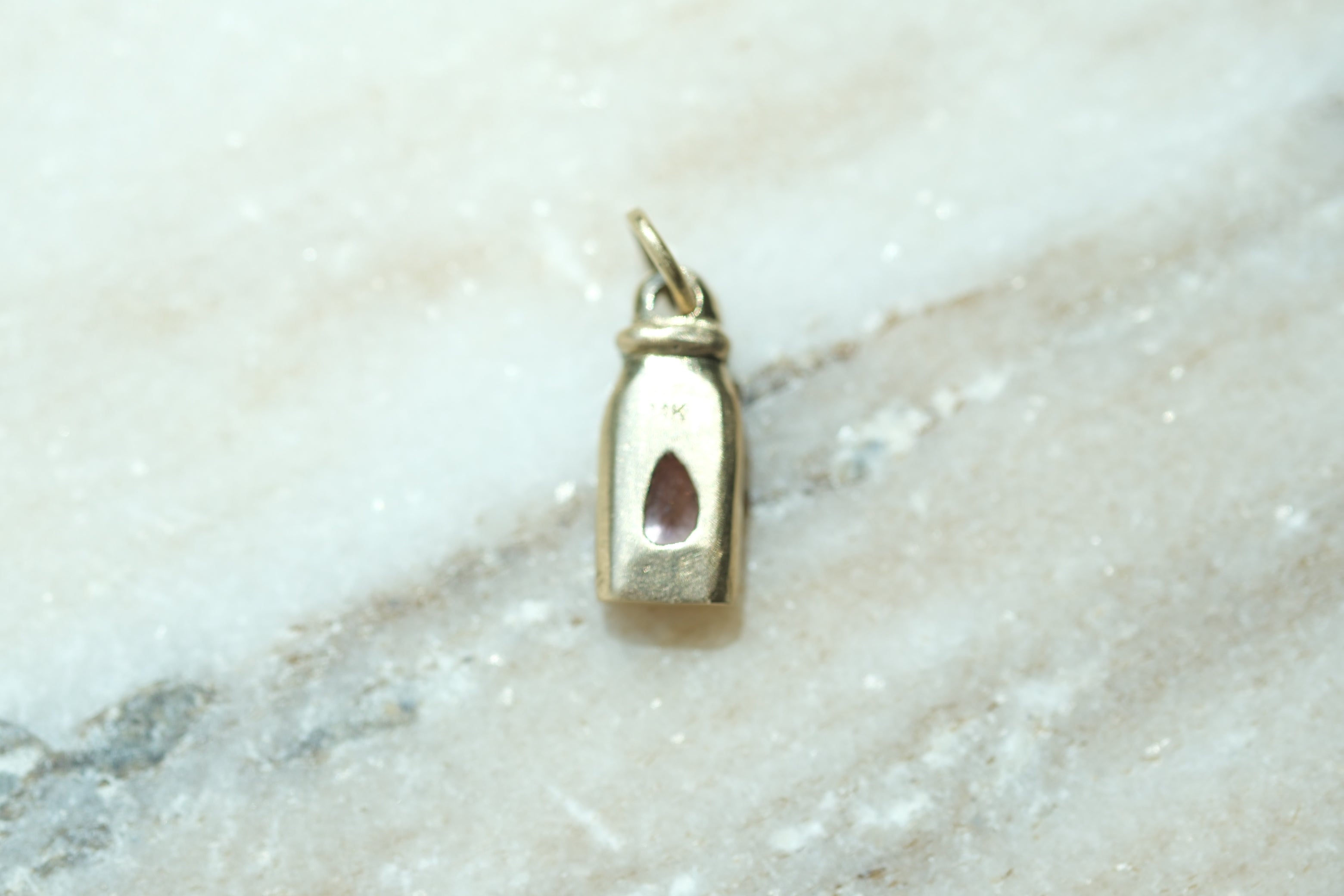 Nectar bottle charm: padparadscha sapphire