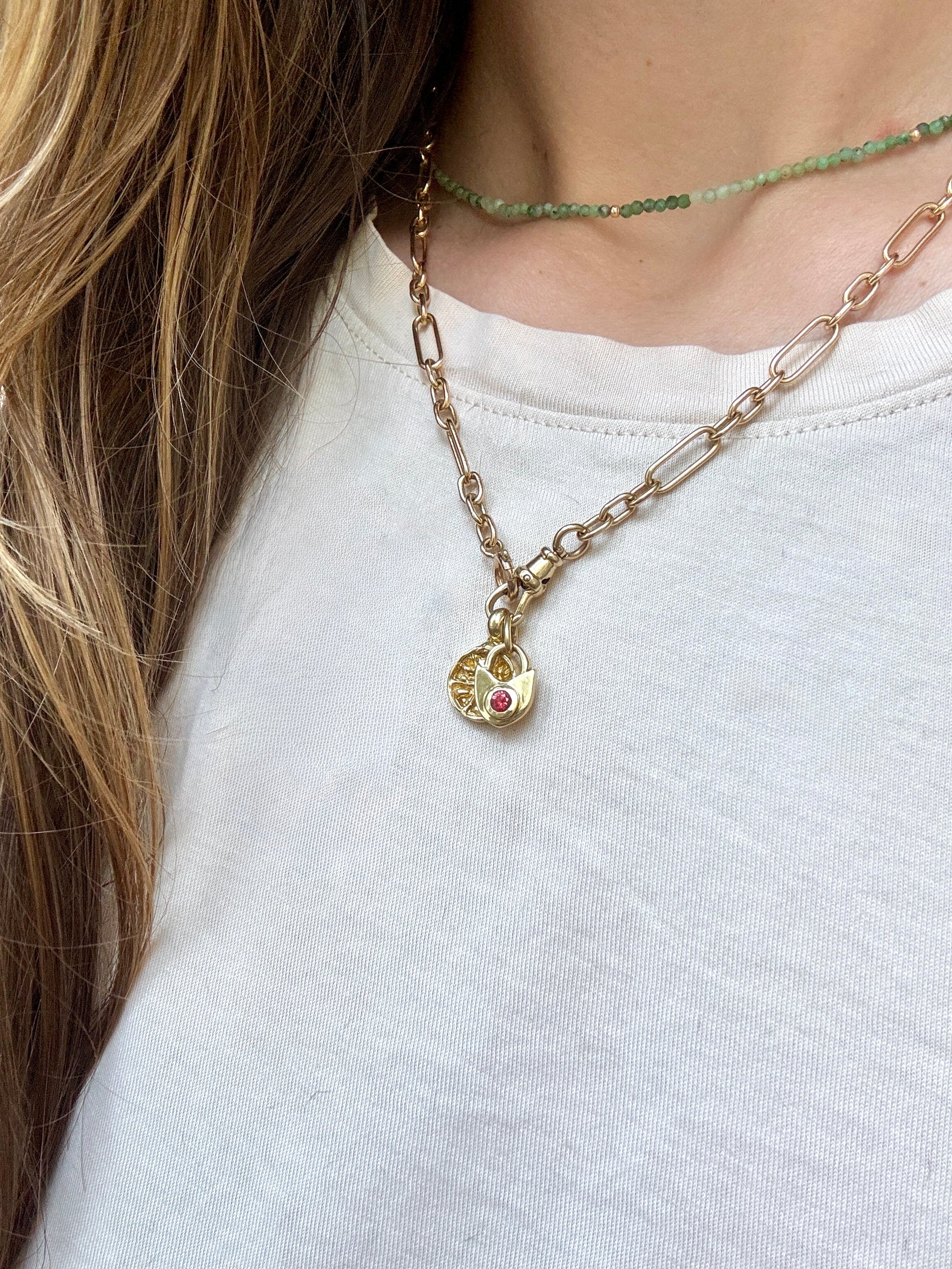 The keep charm: 18k Montana sapphire