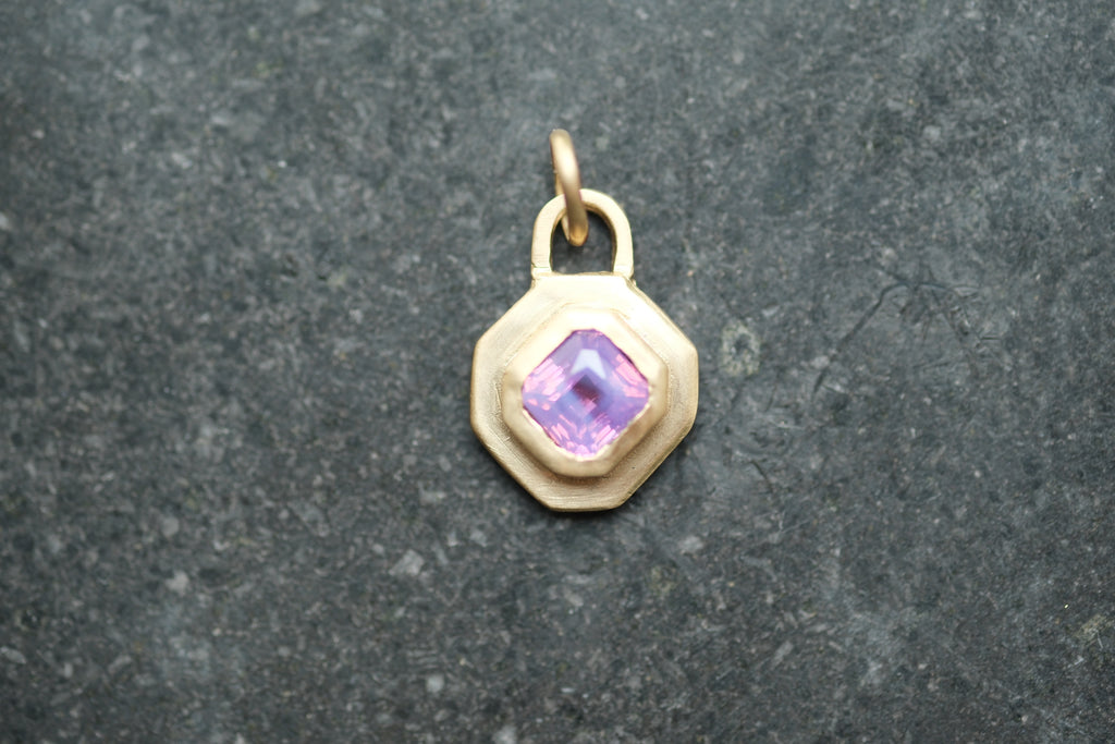 Pinky purple sapphire lock pendant