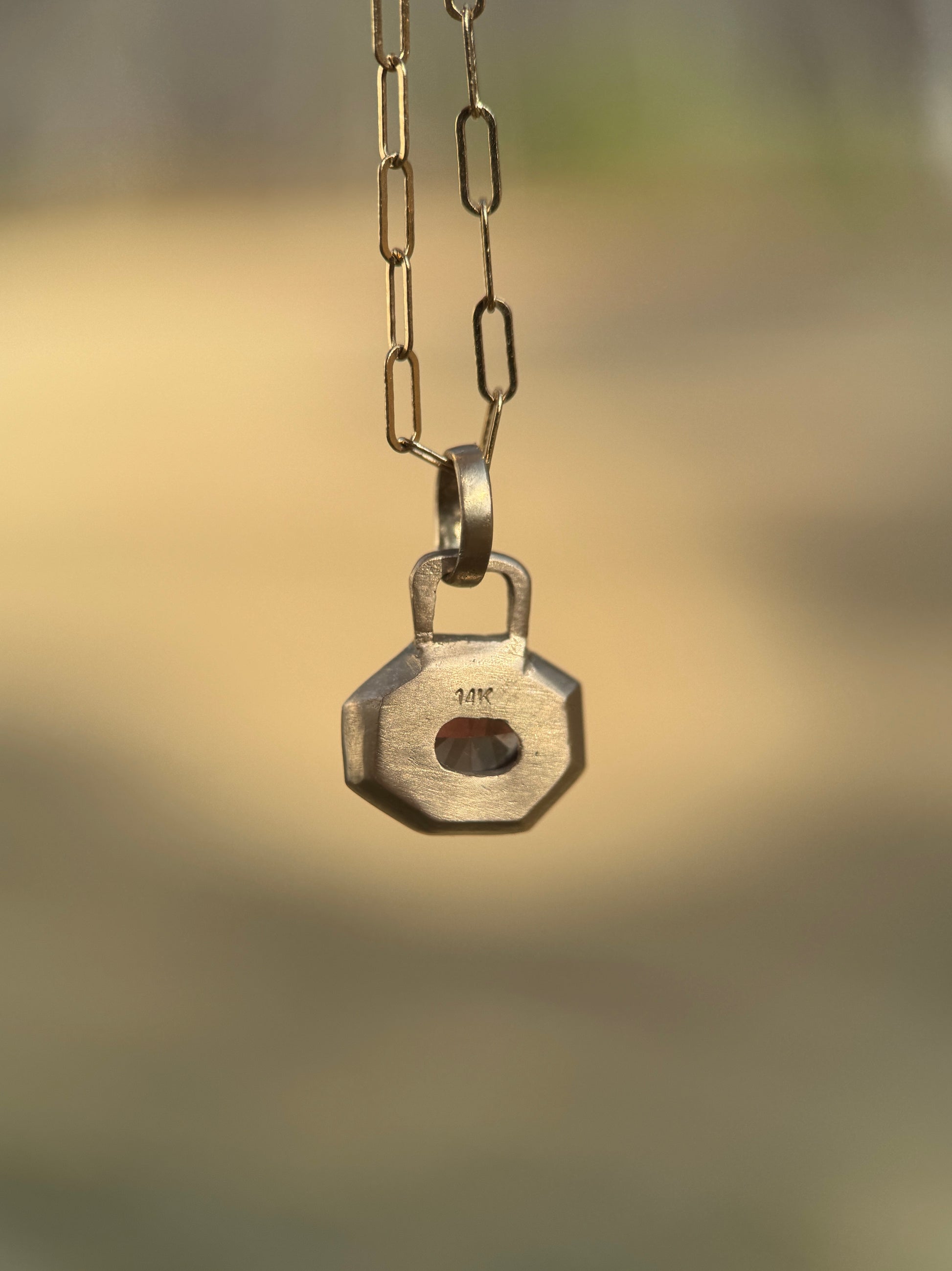 Sunset sapphire lock pendant