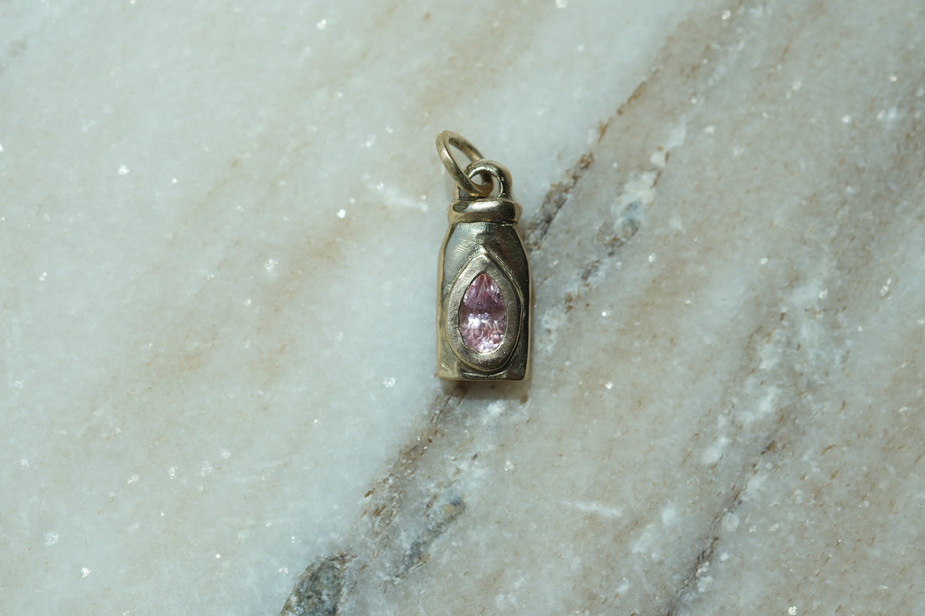 Nectar bottle charm: padparadscha sapphire