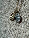Gold and silver charms by Mellis fine jewelry