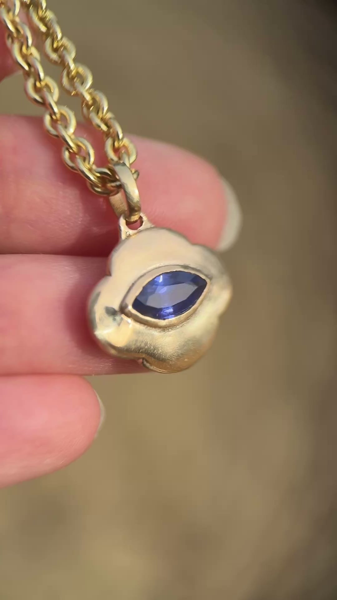Watchful cloud pendant: blue sapphire